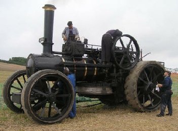 A ploughing engine can be recognised as a very large traction engine with a winch drum under the boiler. The great majority are Fowlers with just a handful made elsewhere. The picture above is of a McLaren.