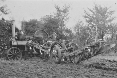 Unidentified Fowler SC and crew with 5f plough (long English mouldboards)